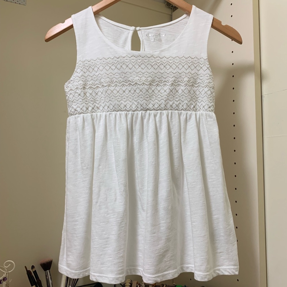 White sleeveless top